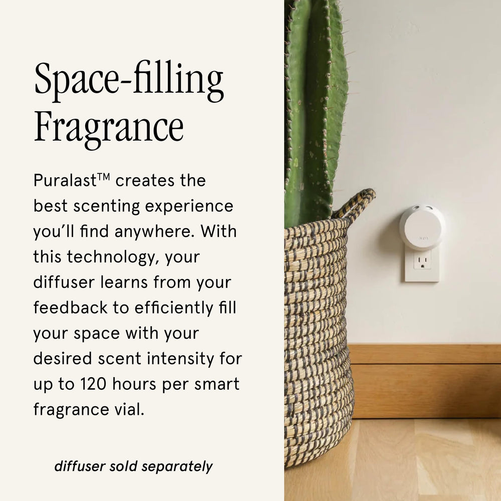 Pura diffuser in a living room creates a spa-like ambiance.