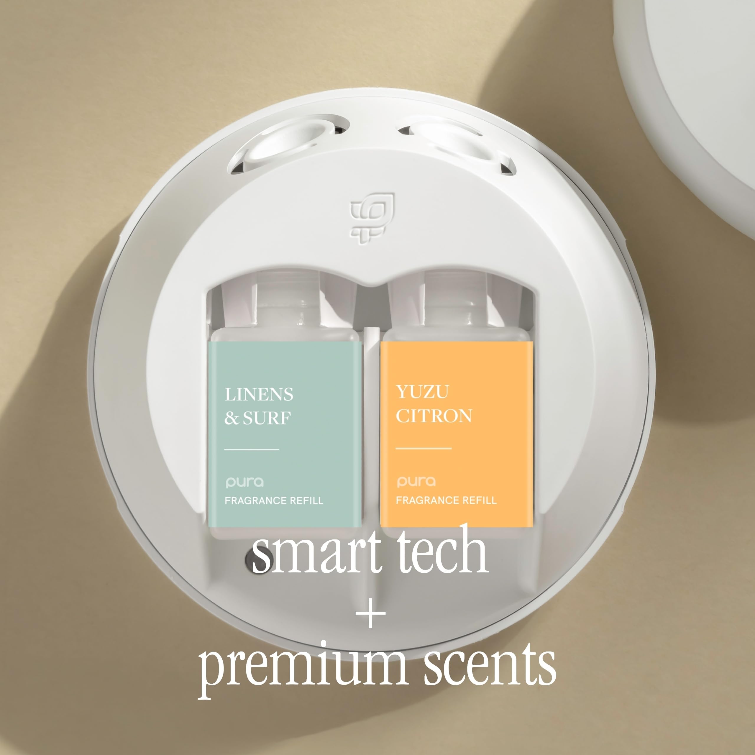 Pura fragrance vials inside the diffuser for customizable scent intensity