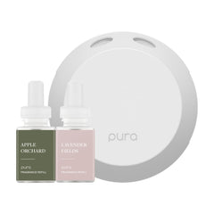 Pura 4 diffuser on a desk delivering a balanced, inviting aroma for your workspace.