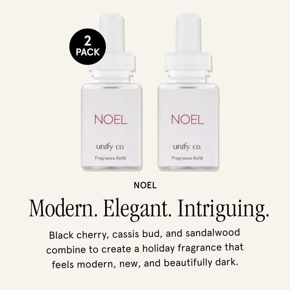 Pura Unify Noel diffuser dispense shown releasing clean fragrance for a welcoming space