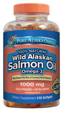 Pure Alaska Omega wild salmon oil bottle pour, convenient softgels for daily omega-3 support.