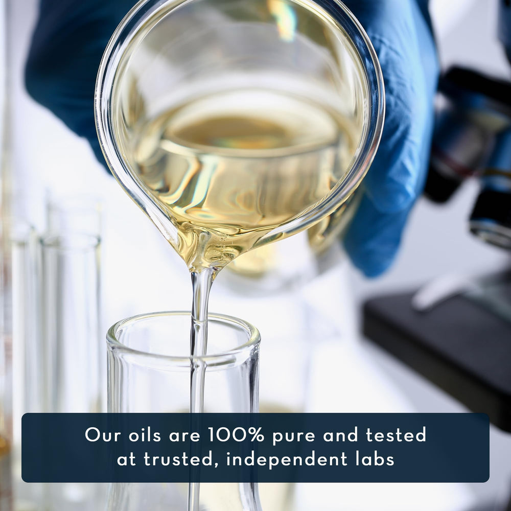 Pure Body Naturals peppermint oil label closeup showing purity and lab verification.