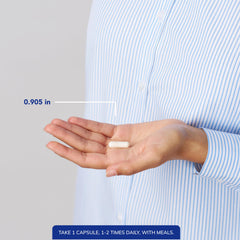 Pure Encapsulations bottle on wood desk with spoon for dosing routine