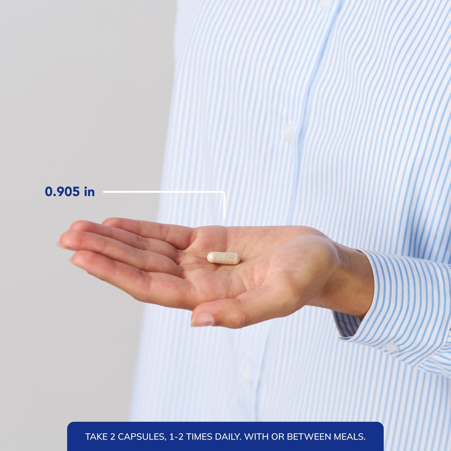 Serving setup with two capsules illustrates daily dosage.