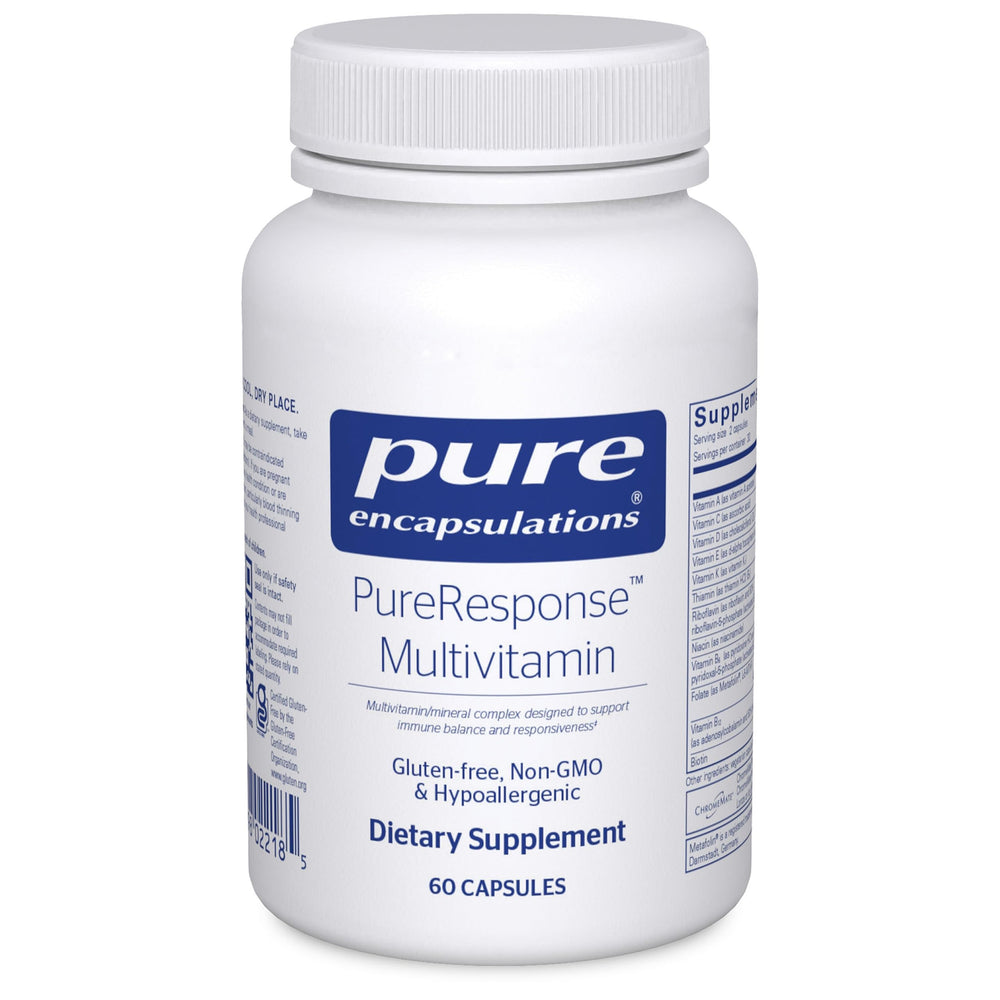 Pure Encapsulations PureResponse Multivitamin bottle on desk for immune balance.