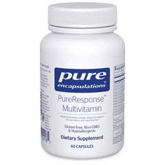 Pure Encapsulations PureResponse Multivitamin bottle on desk for immune balance.