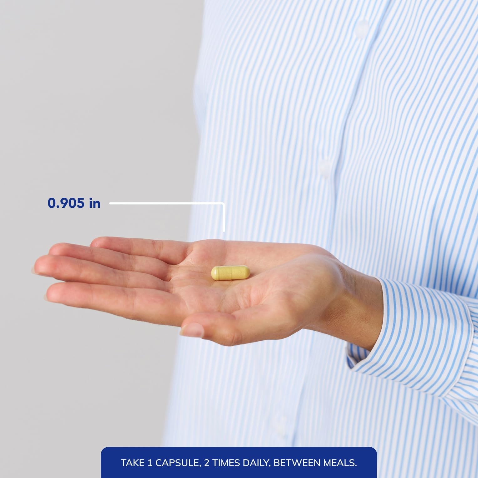 Pure Encapsulations Uric Acid Formula pouring capsules in hand, easy daily administration.
