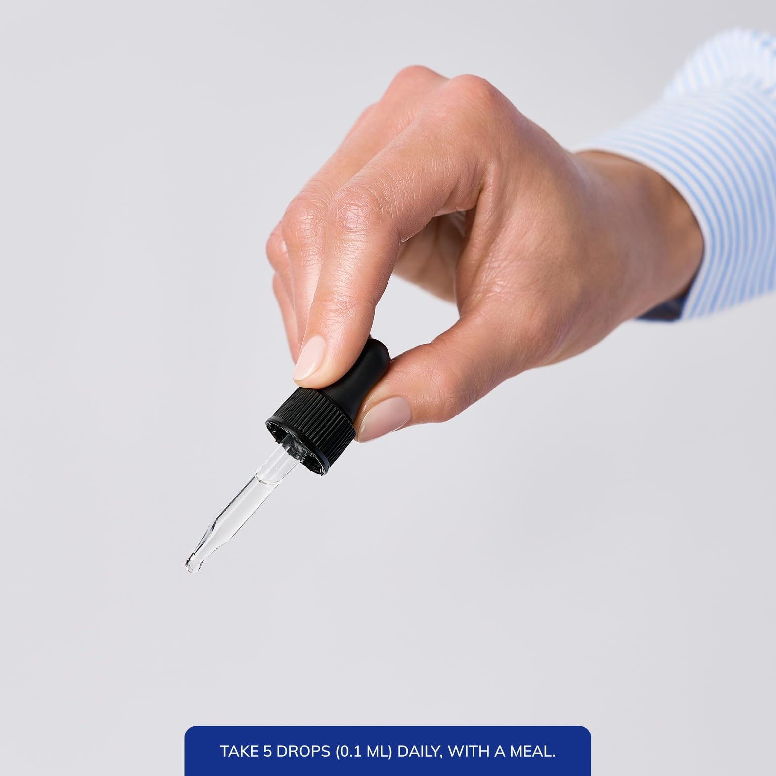 Pure Encapsulations Vitamin D3 (Vegan) Liquid dropper demonstrates precise micro-dosing for daily use