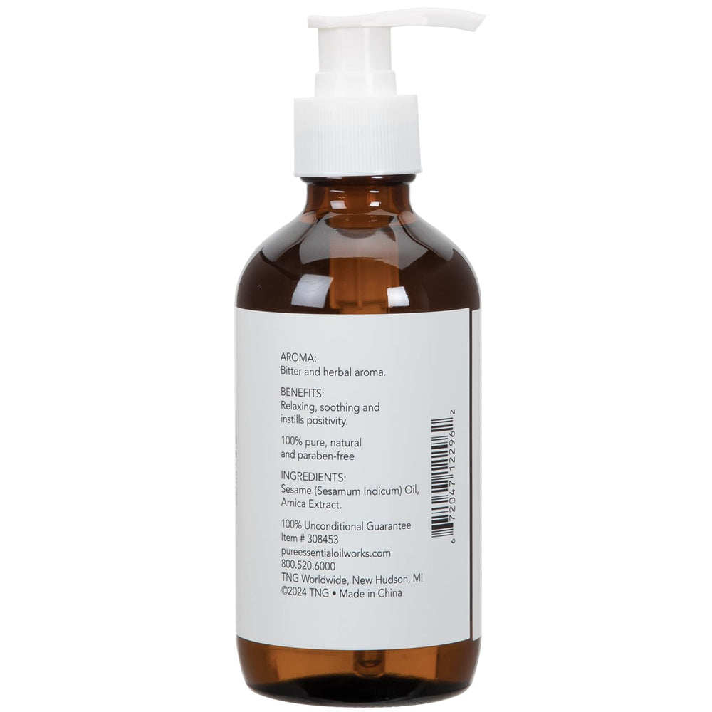 Arnica Oil bottle label closeup emphasizing all-natural, paraben-free formula.