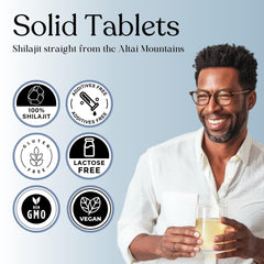 Closeup of Pure Himalayan Shilajit Dry Drops tablets emphasizing 200mg per serving