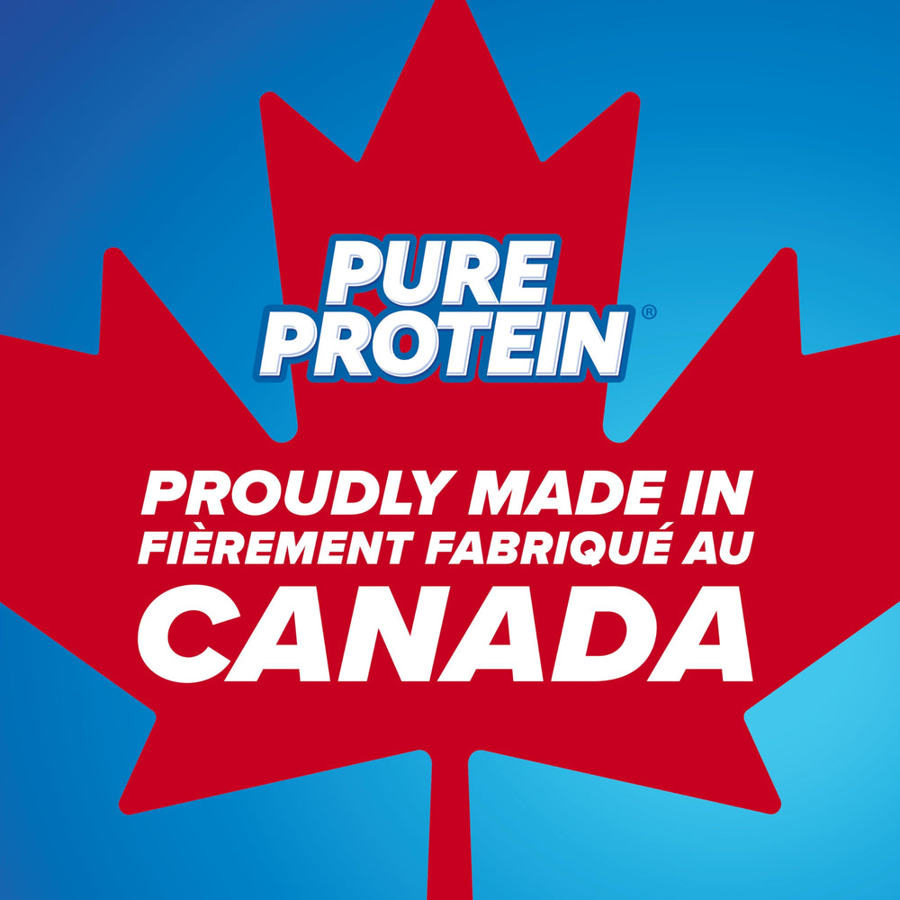Pure Protein bar being unwrapped, ready to fuel a workout or commute