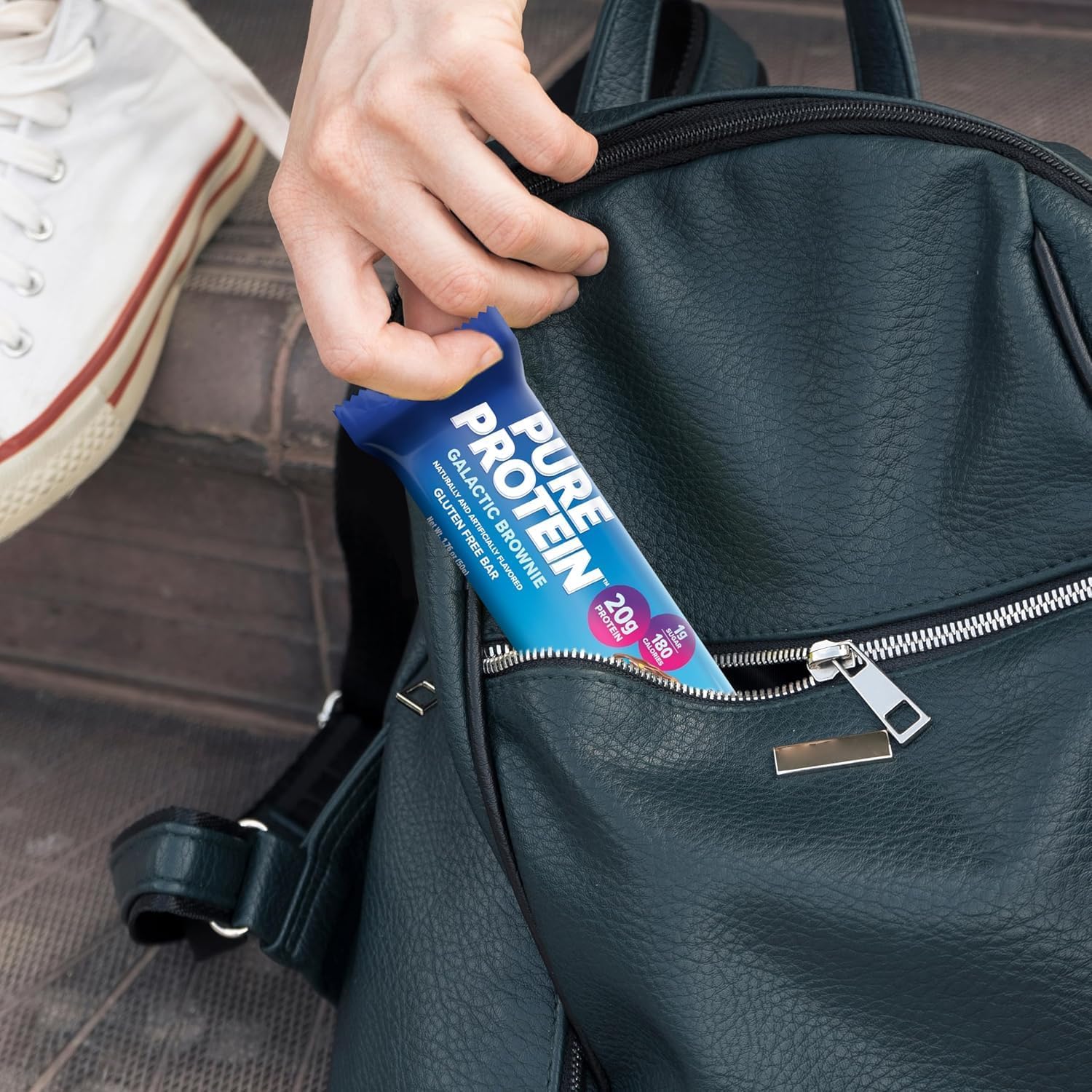 Post-workout scene with Pure Protein bar for replenishment.