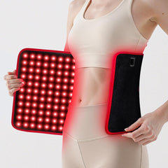 Purella red light therapy mat on back and shoulders for soothing warmth.