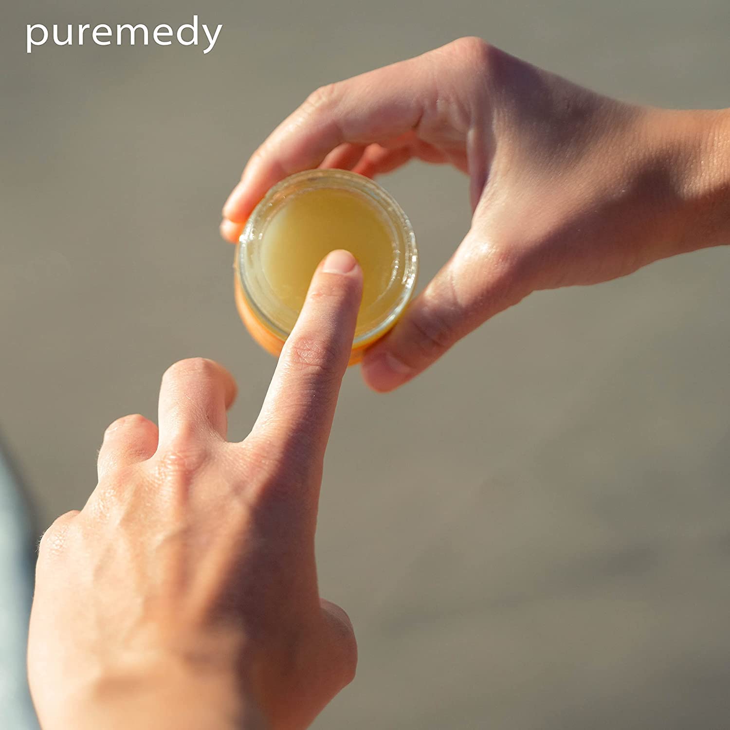 Puremedy Clarifying Nail Ointment being applied near nails for routine care