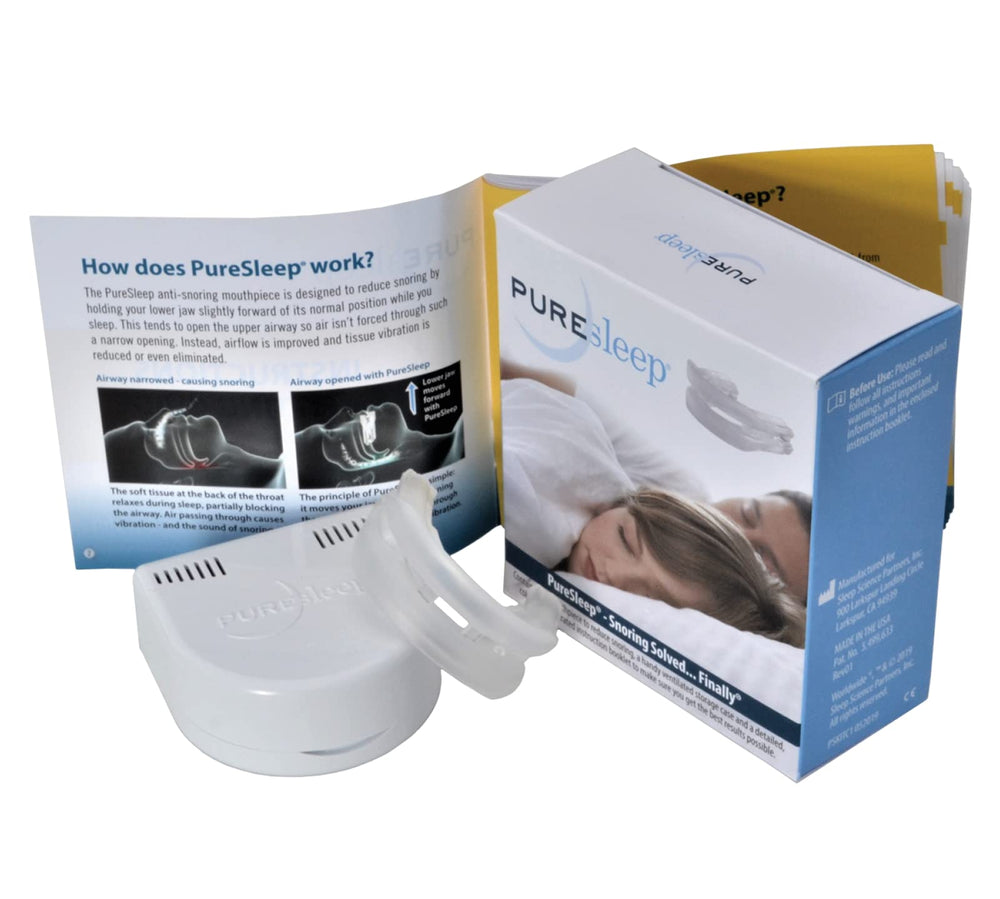 PureSleep original snoring mouthpiece held in hand, showing compact, comfortable design.