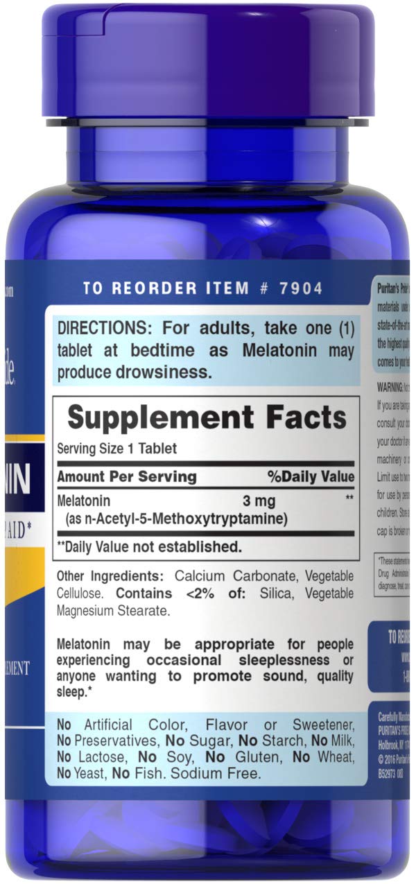 Puritan's Pride melatonin tablets label close-up highlighting vegetarian ingredients and sleep support.