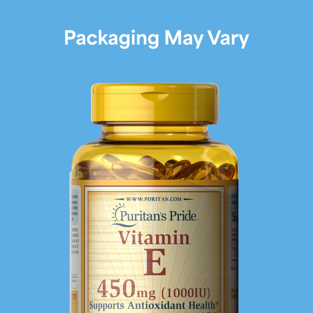 Closeup of Puritan's Pride Vitamin E-450mg softgels highlighting potency