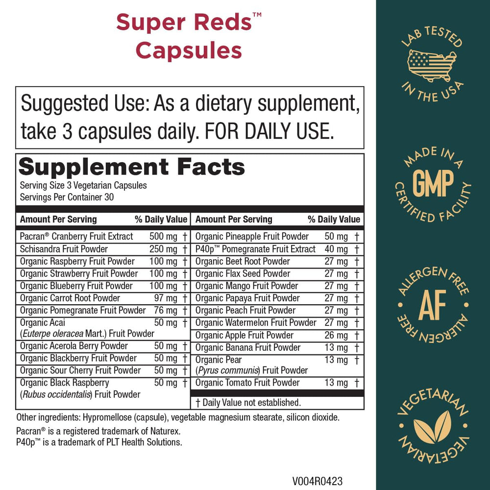 Purity Products Super Reds capsules close-up highlighting organic berries and phytonutrients.