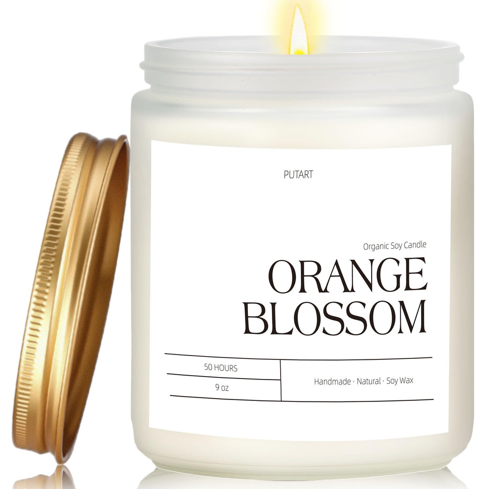 Putart Orange Blossom Candle jar emitting a warm, inviting aroma