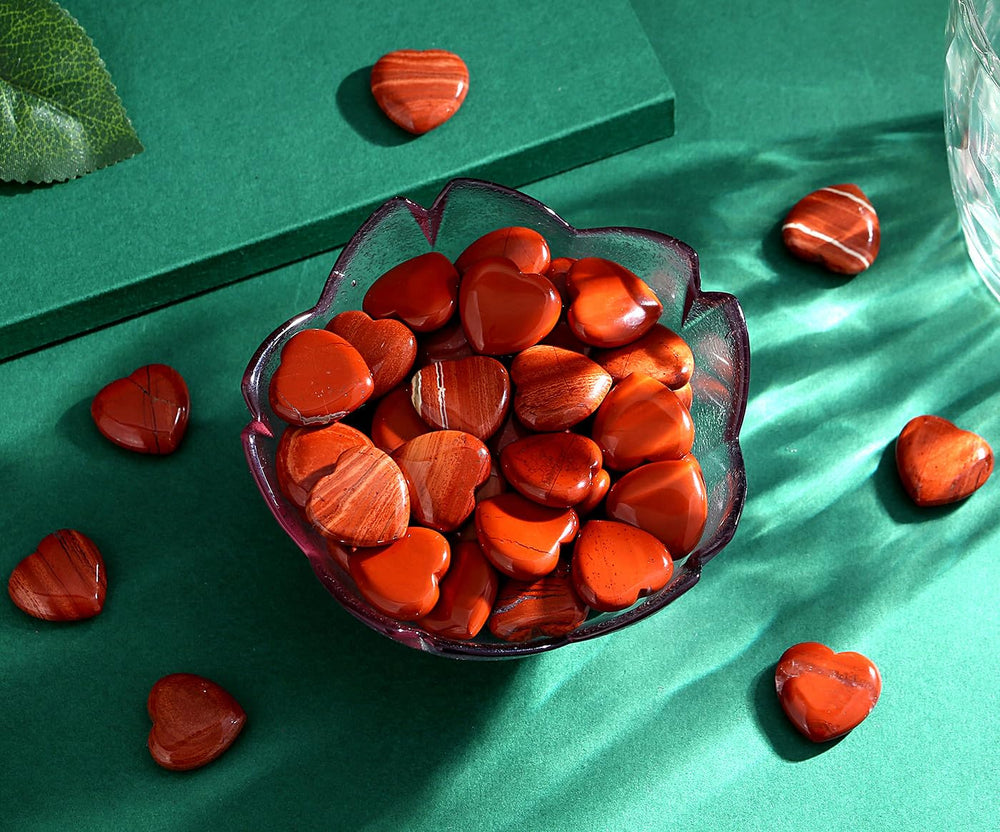 QINJIEJIE red jasper heart stone in yoga or meditation.