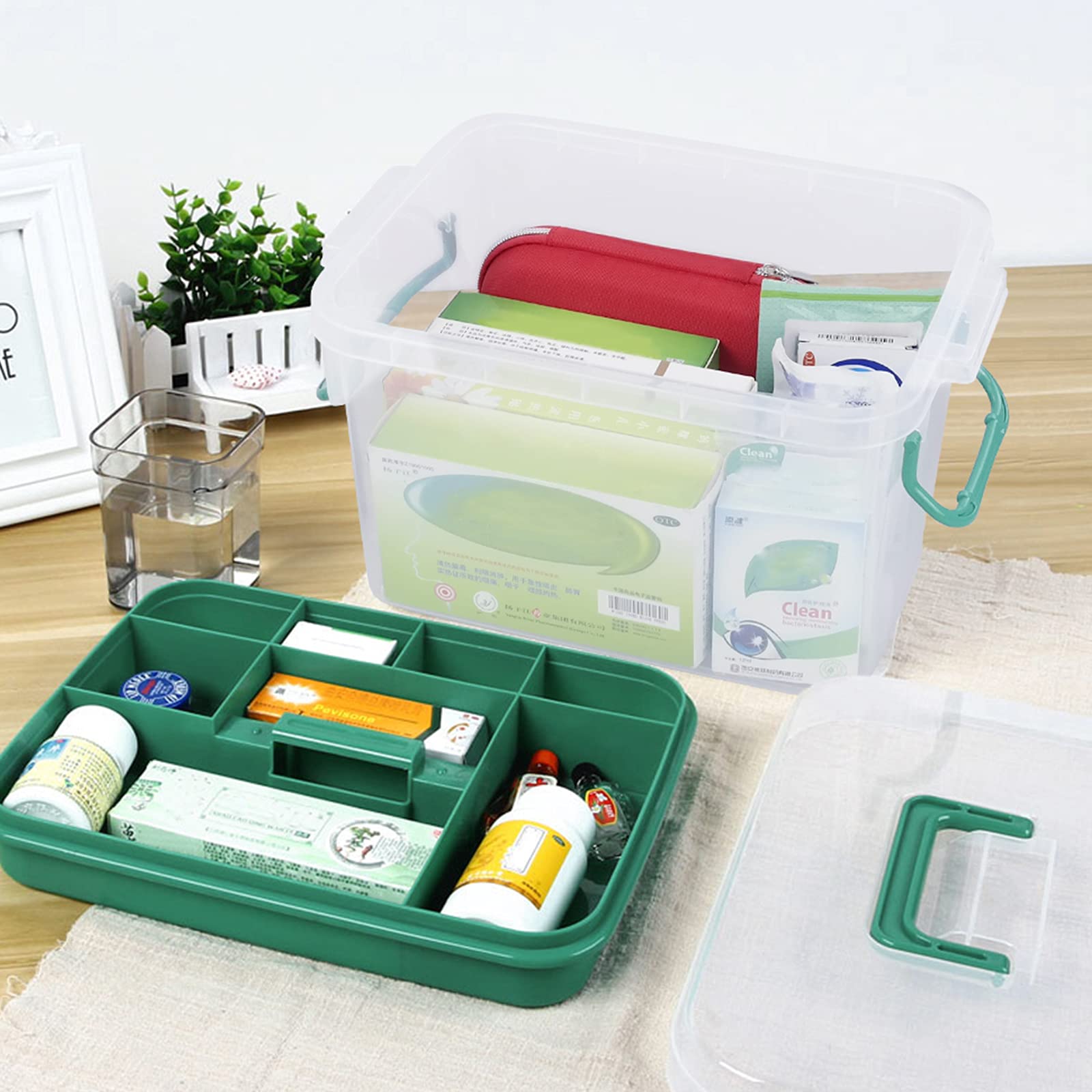 Qskely clear storage box interior with removable divider tray for organized grouping.