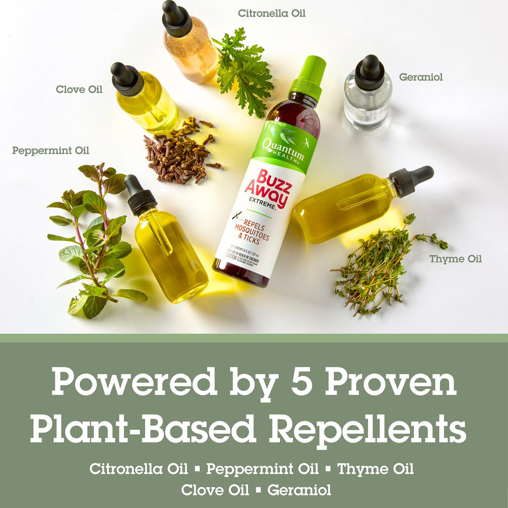 Travel-size Quantum Health Buzz Away Extreme bottle beside essentials