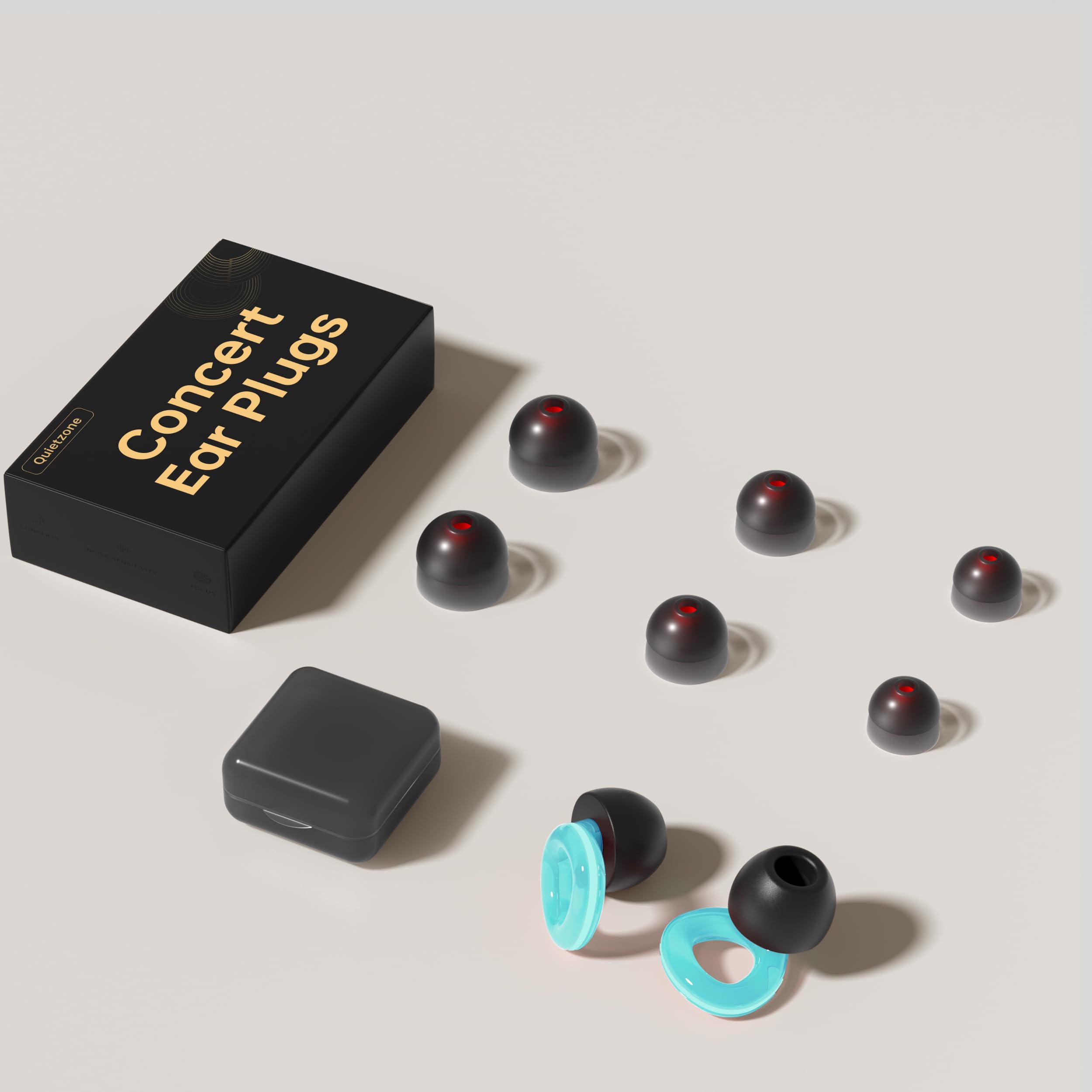 QuietZone concert ear plugs package showing three soft silicone tips included