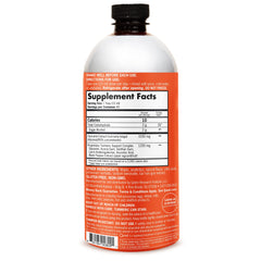 Qunol Liquid Turmeric bottle pour scene highlighting black pepper for absorption