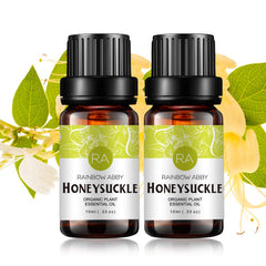 Rainbow Abby Honeysuckle essential oil bottle close-up showing floral aroma.