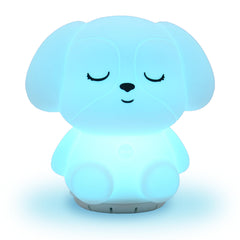 RAINLAX Mindfulness Breathing Puppy glows softly on a nightstand for calm evenings.