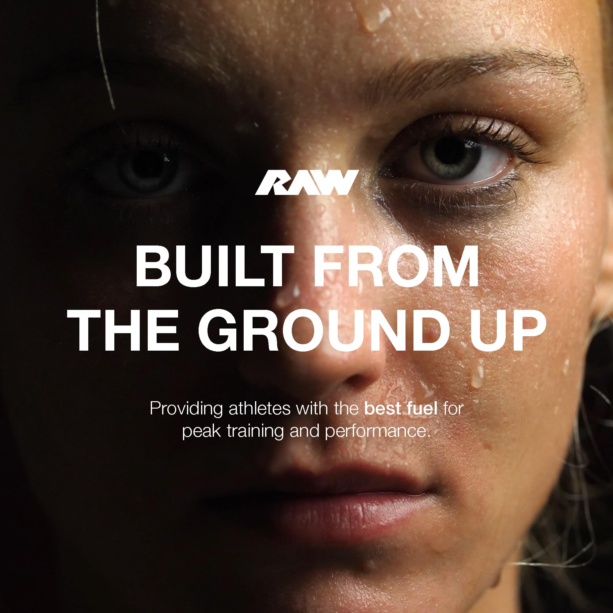 Gym shelf displays RAW Essential Performance tub with clean labeling.