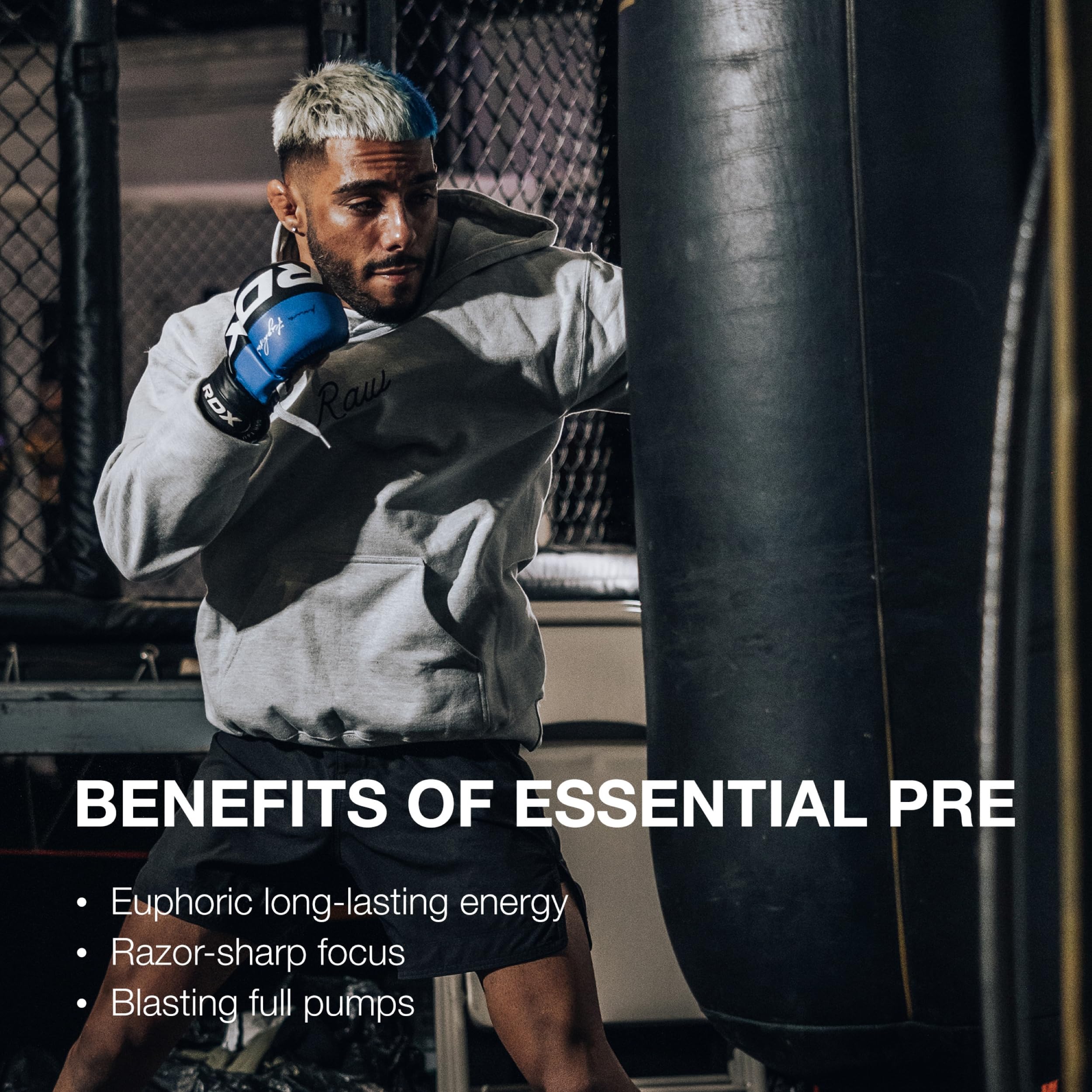 RAW Essential Pre-Workout Orange on desk with label details and product vibe.