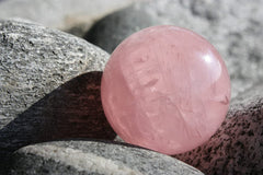 RCSTONE hand therapy with pink rose quartz Baoding balls for finger strength.