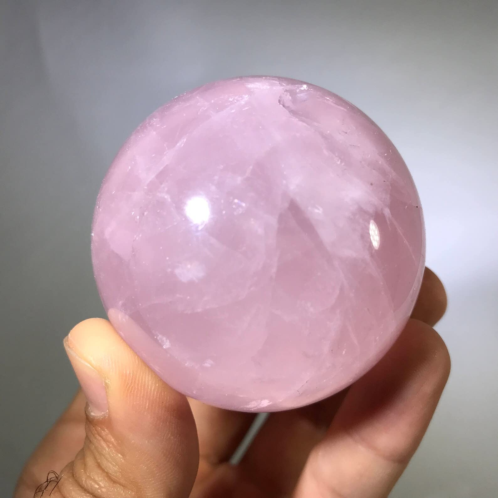 RCSTONE rose quartz Baoding balls surface polished for smooth, mindful rotation.
