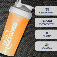 Real Ketones electrolyte boost packet beside glass, sugar-free hydration.