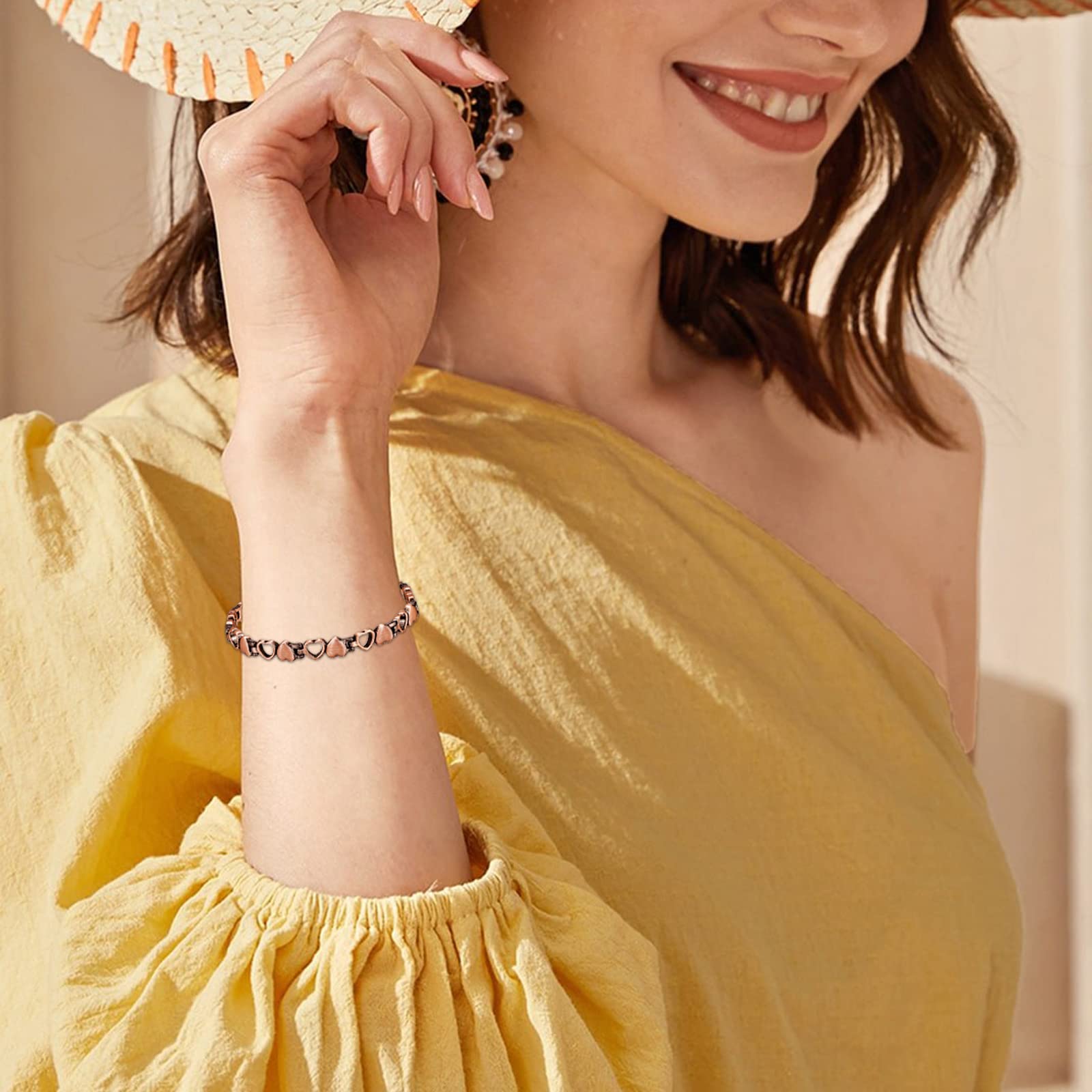 Reaowazo love heart design bracelet adds a romantic touch.