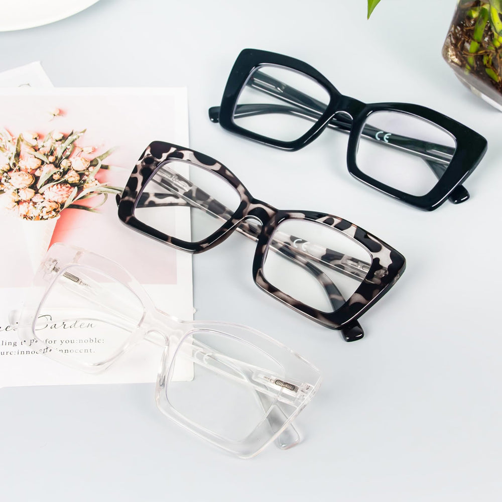 REAVEE large framed readers worn at desk and on the go for versatility.