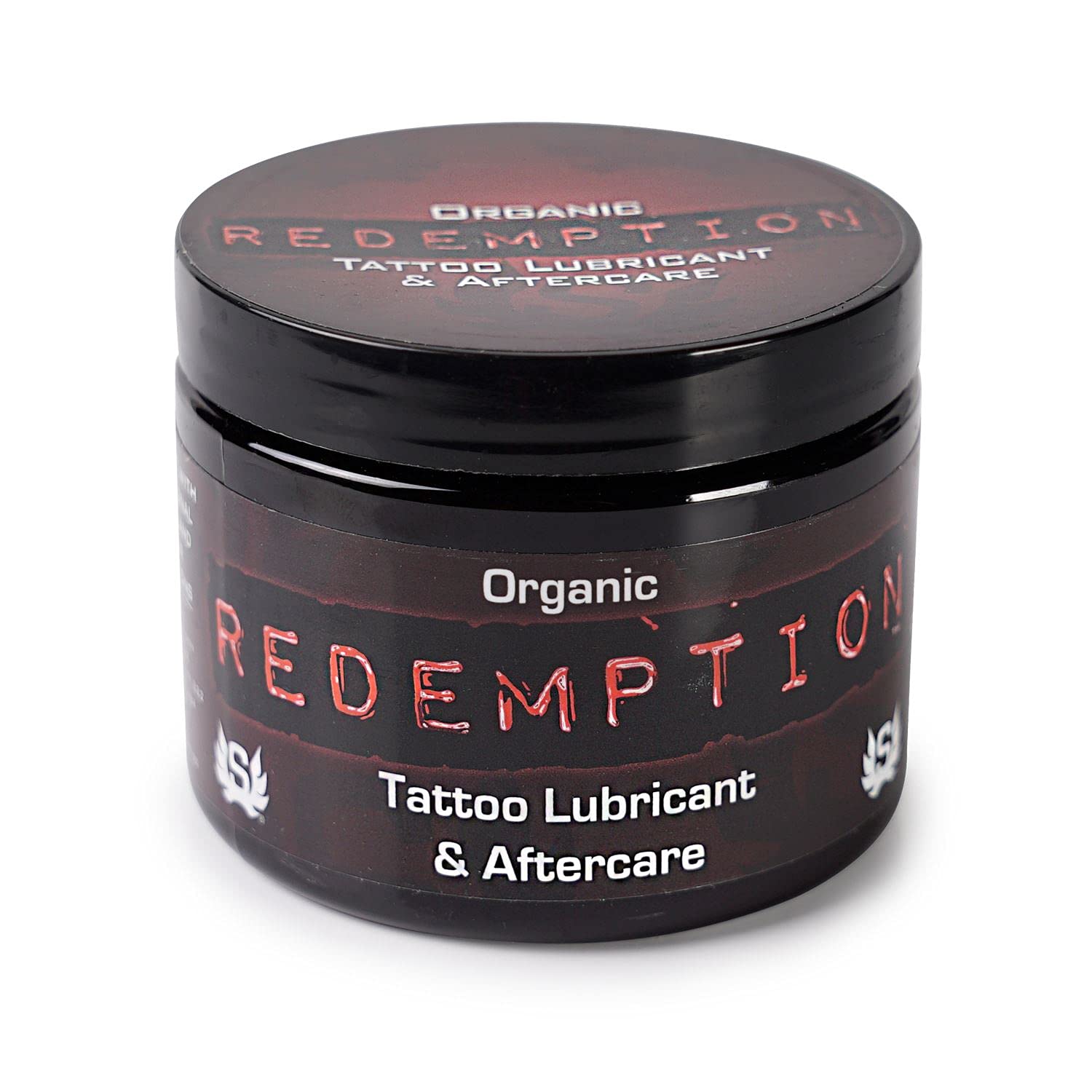 Redemption Tattoo Lubricant jar close-up for during tattoo sessions and aftercare hydration.