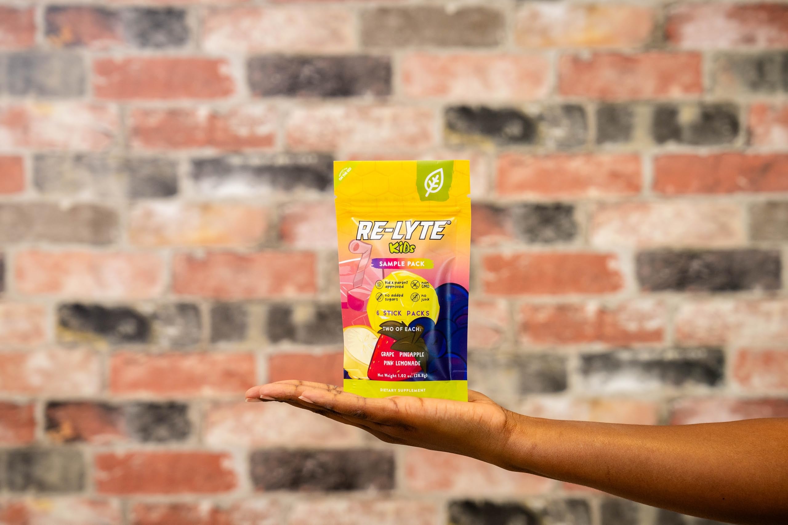 Redmond Re-Lyte Kids pink lemonade flavor, vibrant color for refreshing hydration.