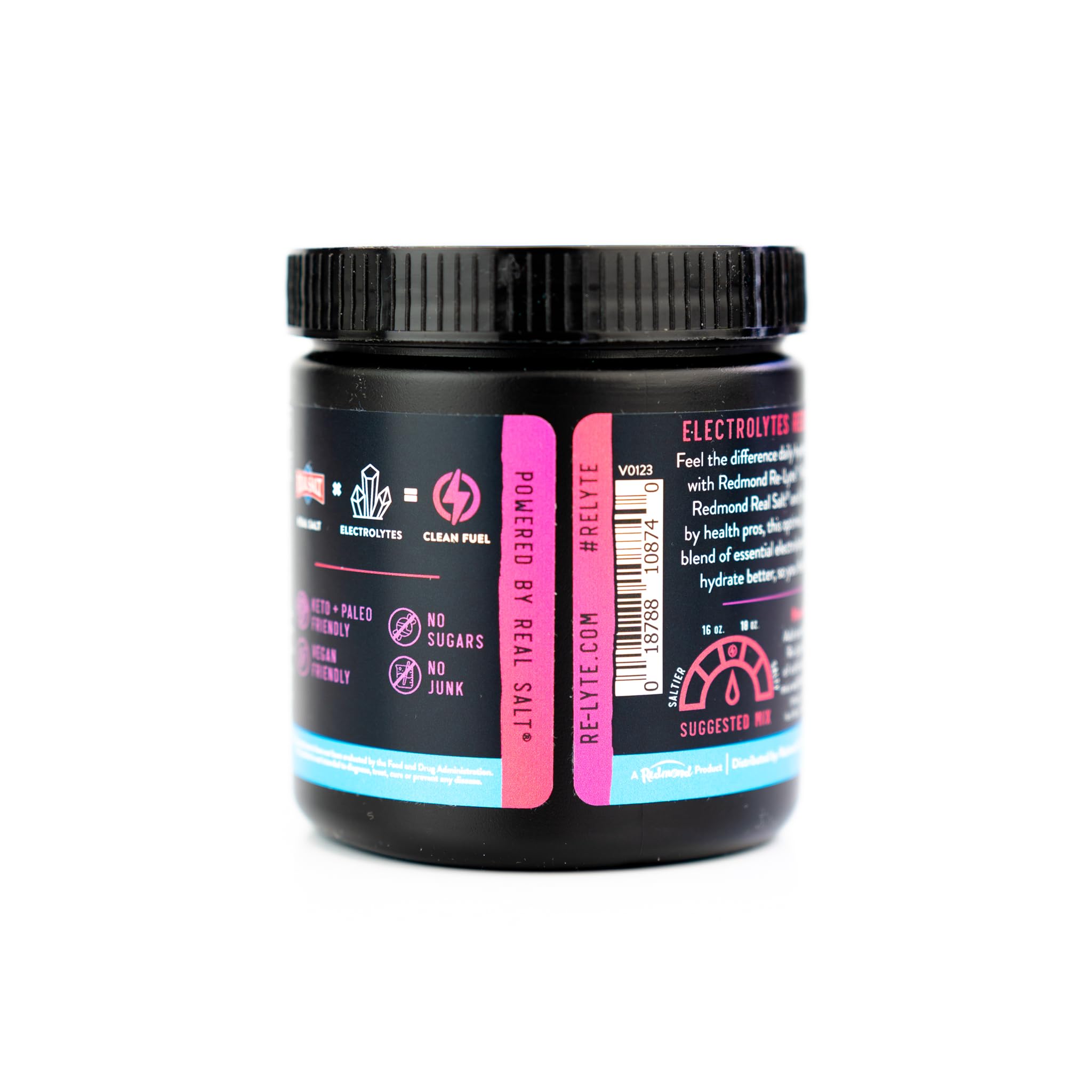 Redmond Re-Lyte powder dissolving in water – demonstrates quick mixability and berry color.