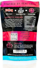 Redmond Re-Lyte Mixed Berry stick being added to a water bottle.