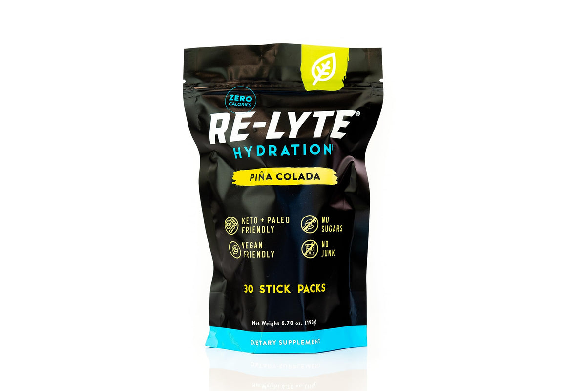 REDMOND Re-Lyte Pina Colada bottle showcases tropical hydration with real salt minerals.