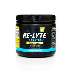 Redmond Re-Lyte Pina Colada powder in tub for island-inspired hydration.