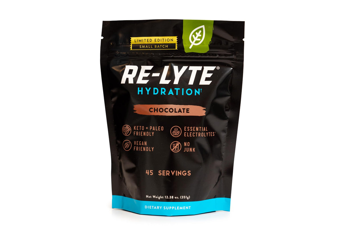 Redmond Re-Lyte chocolate scoop in water for refreshing hydration
