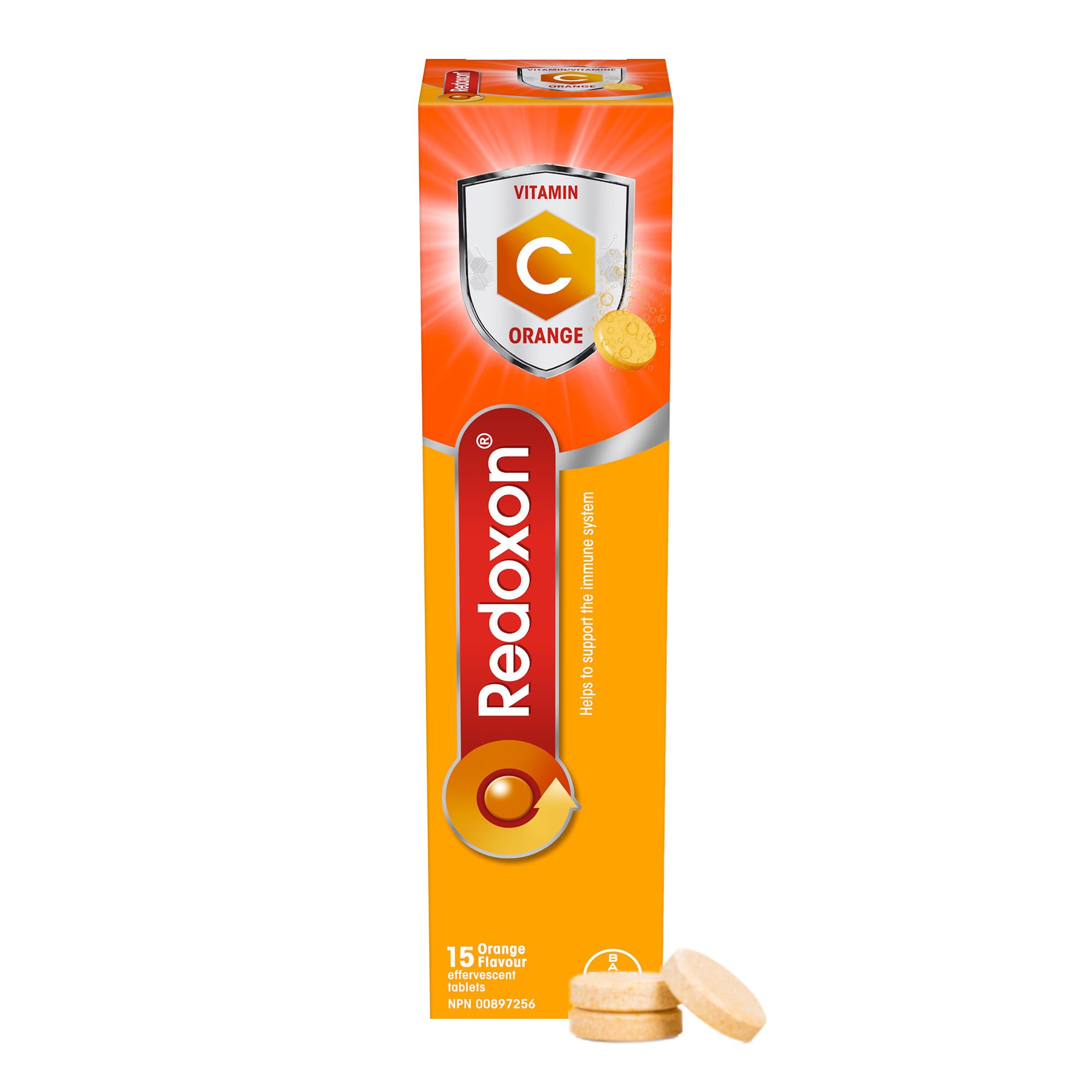Redoxon Orange tablets poured into a glass for a refreshing vitamin C boost