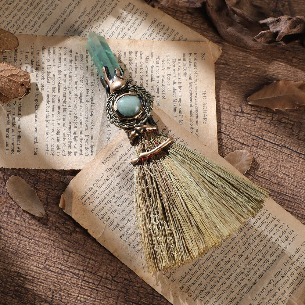 RENEMEGO Witch Broom shows branch and metal accents for sacred space.