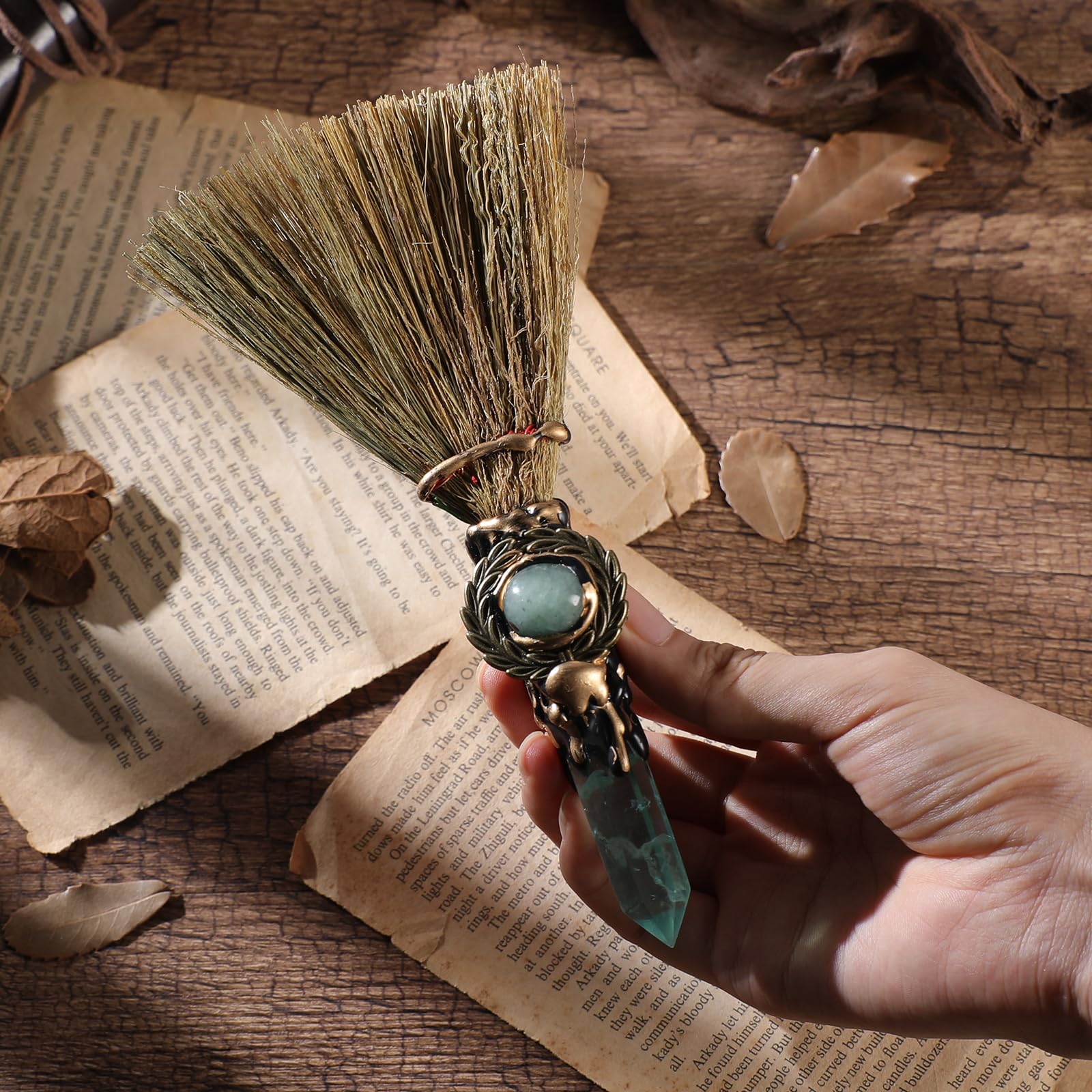 RENEMEGO Witch Broom wall décor adds mystical ambiance.