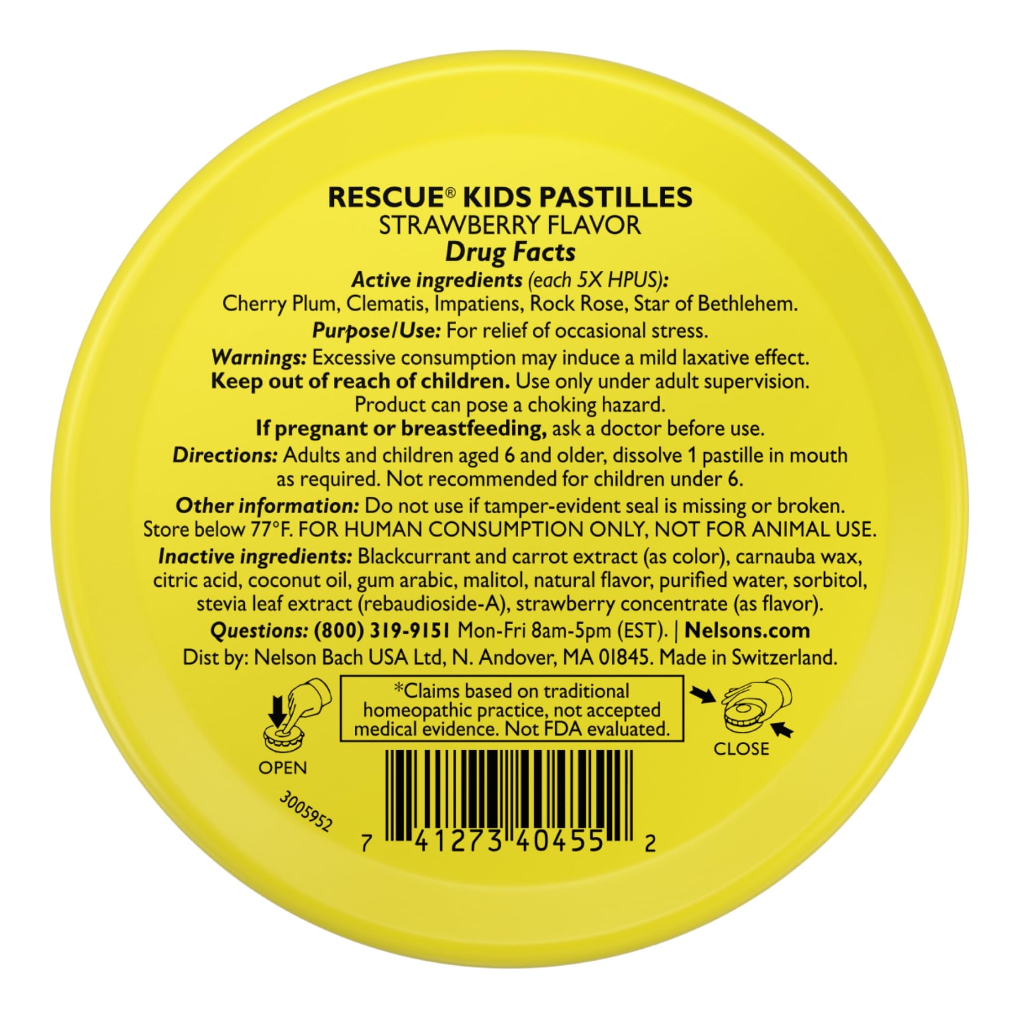 Close up of RESCUE Kids Pastilles strawberry lozenge on hand