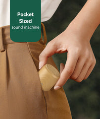 Restnature portable sound machine in use beside nightstand for bedtime calm.