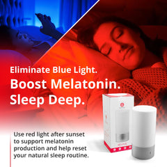 Revive red light sleep lamp casts amber tones for a peaceful bedroom atmosphere.